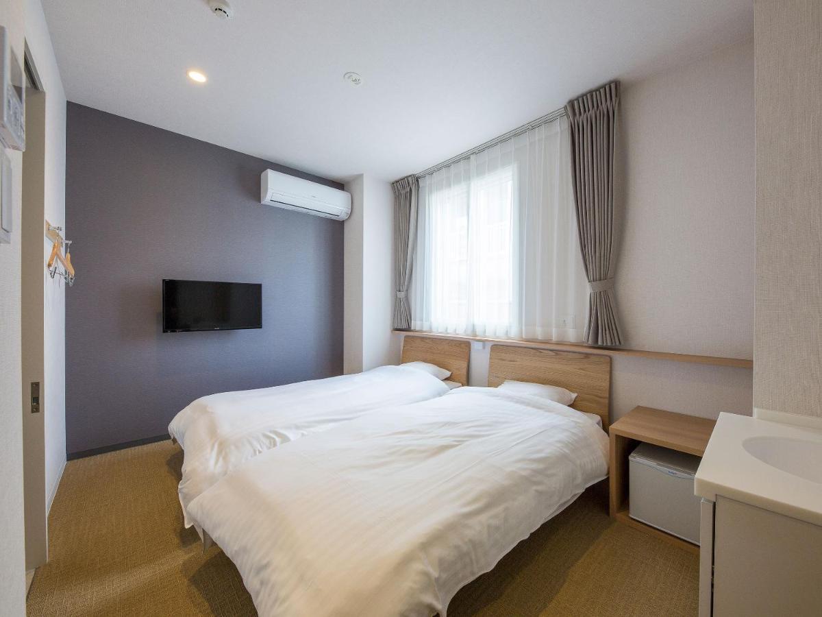 Hotel Plus Hostel Sapporo Extérieur photo